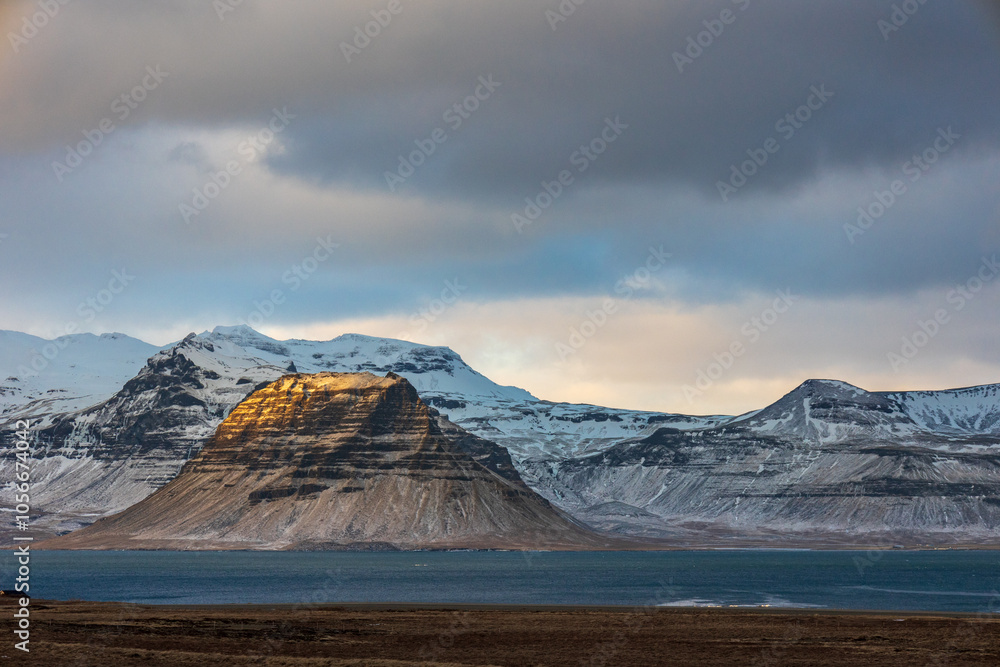 Kirkjufell mountain in a stormy winter day