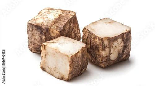 Taro root cube isolated on a white background