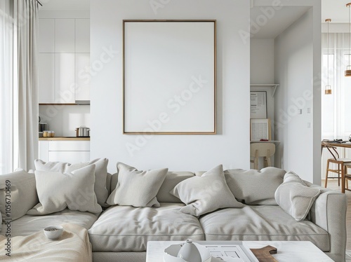 Modern living room interior with a large blank canvas frame above a grey sofa with cushions and a coffee table