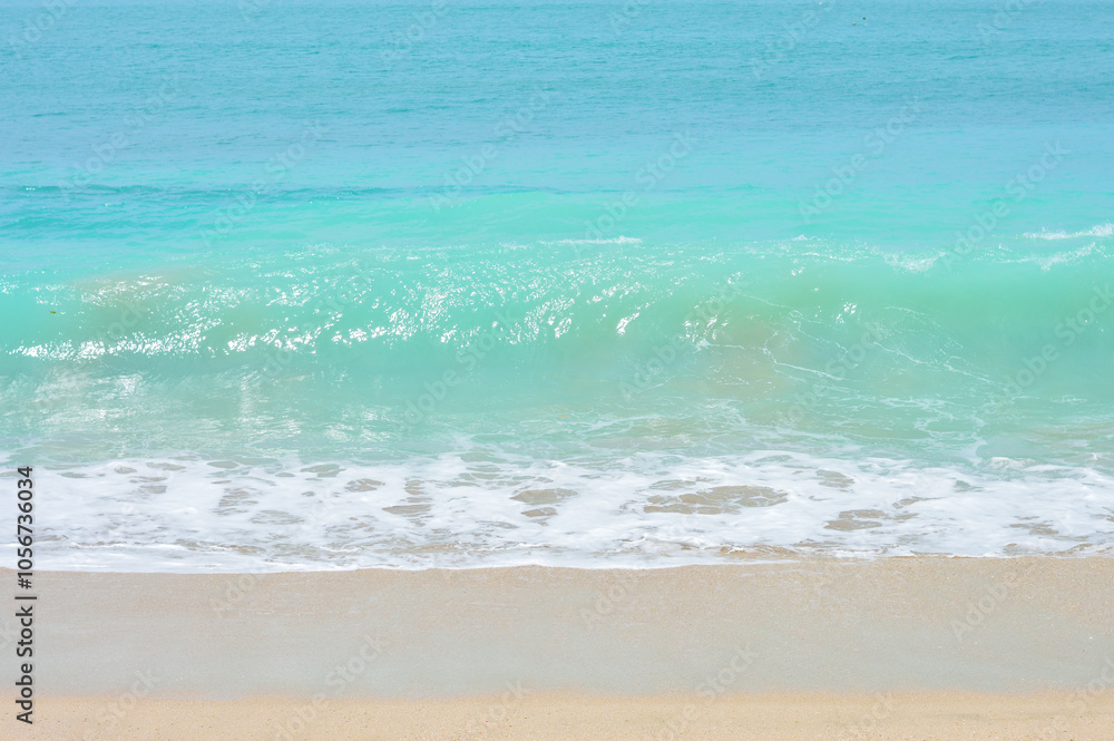 Blurred view of beautiful blue waves at the beach Blurred view of beautiful blue waves at the beach