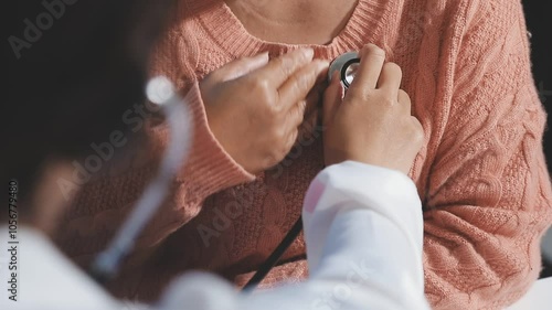 Doctor is using a stethoscope for patient examination. To hear the heart rate, For patients with heart disease.