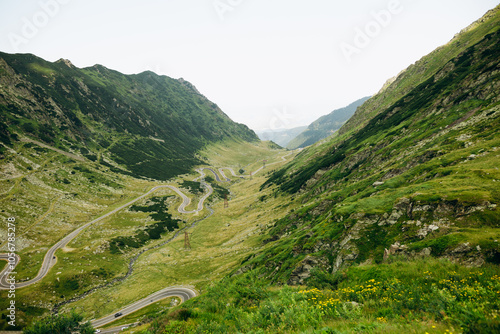 View of cars on Transfagarasan road in Fagaras Mountain. Transfagarasan famous curvy road in Romania. 