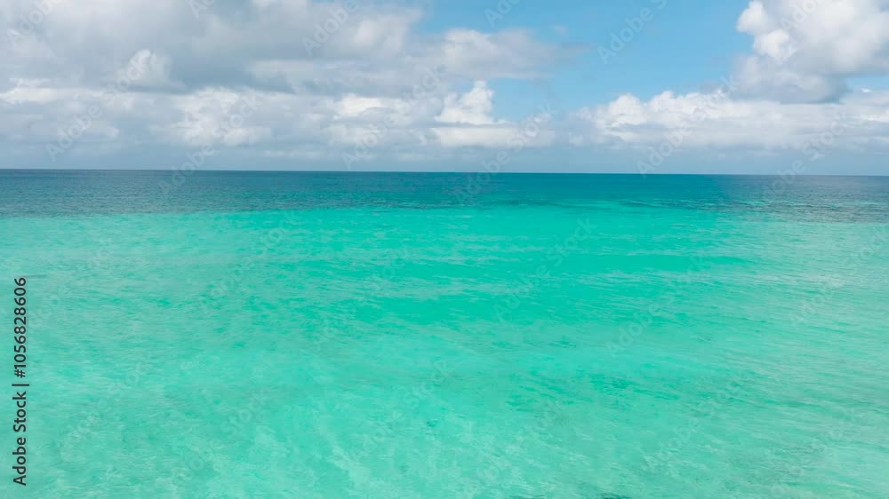 Transparent turquoise sea water. Blue sky and clouds. Boracay, Philippines. Transparent turquoise sea water. Blue sky and clouds. Boracay, Philippines.