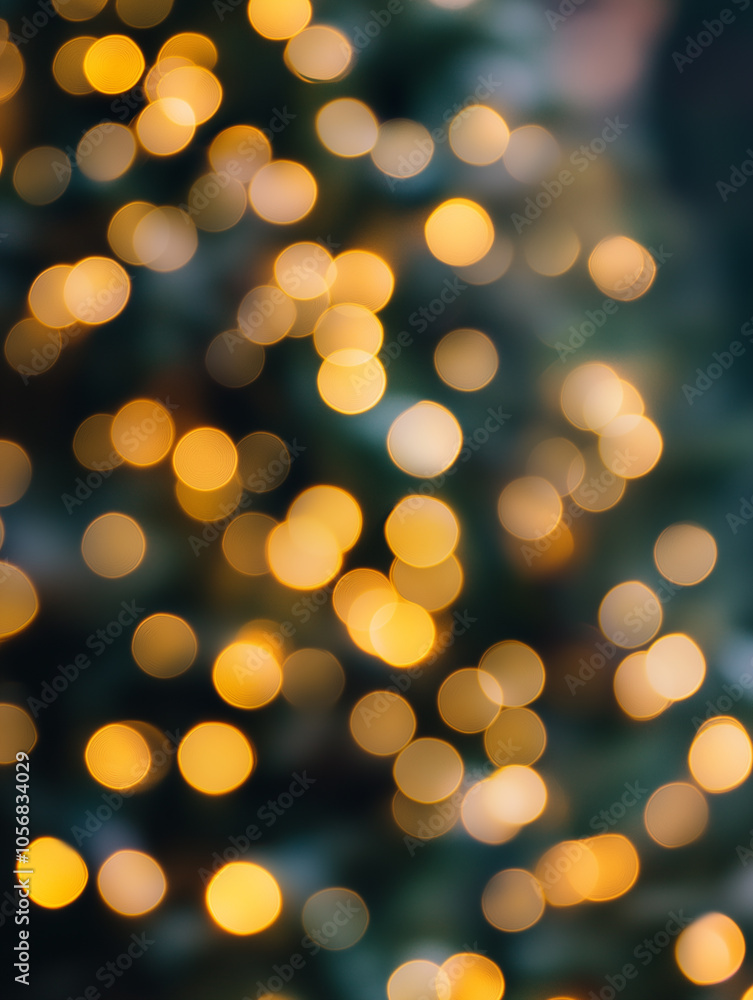 Obraz premium Defocused blurred background, golden сhristmas lights, bokeh. Copyspace, background for postcard, banner. 