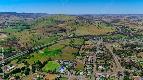 defaultPanoramic aerial drone view of NSW New South Wales Country town of Gundagai with Houses roads and parks mountains and farm land in between Sydney NSW and Melbourne VIC Australiadefault