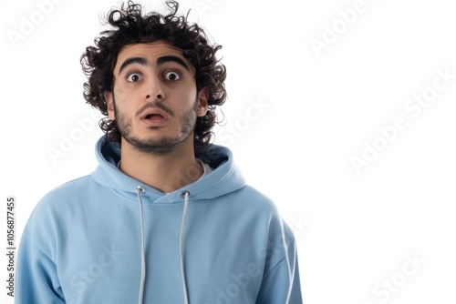 A young man wearing a blue hoodie with curly hair, perfect for a variety of uses such as a portrait or lifestyle image