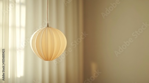 Single soft-toned plastic lamp, hanging against a light backdrop; minimalism meets modern elegance in a serene setting.