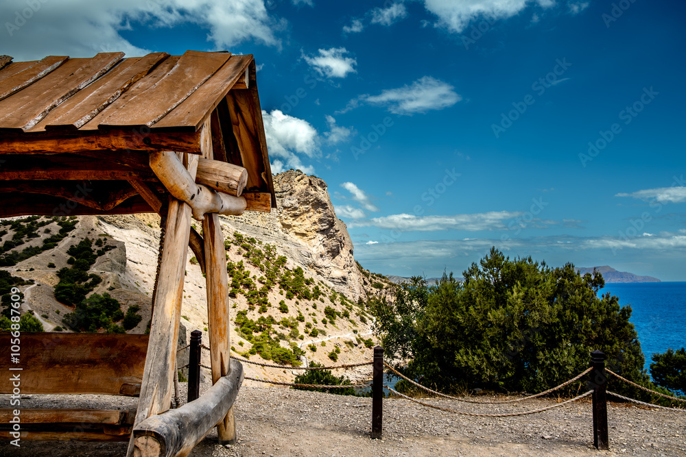 Wooden gazebo for relaxing on the background of the mountains. Wooden gazebo for relaxing on the background of the mountains.