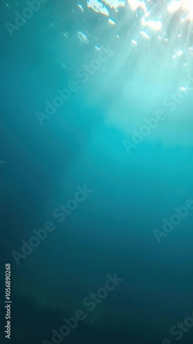 Hazy underwater view of the ocean floor with sunlight filtering through, ocean, beauty