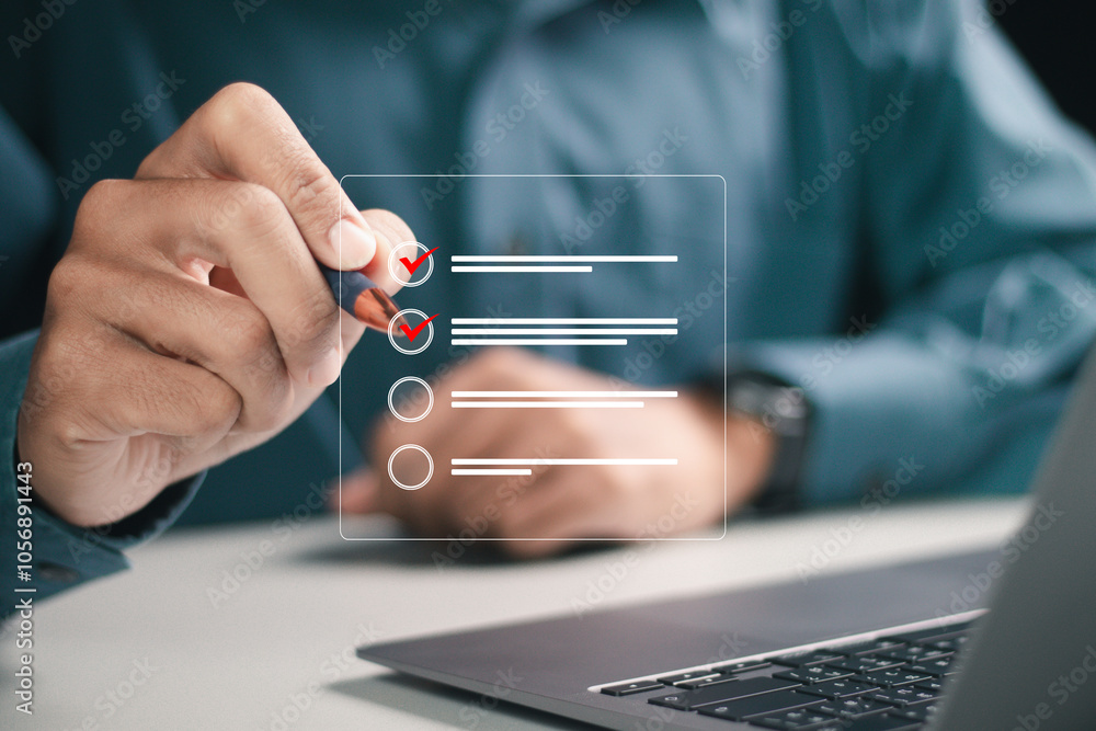 Business performance monitoring and evaluation concept, Businessman take business performance assessment, online checklist survey. Filling out digital checklist. Business performance monitoring and evaluation concept, Businessman take business performance assessment, online checklist survey. Filling out digital checklist.