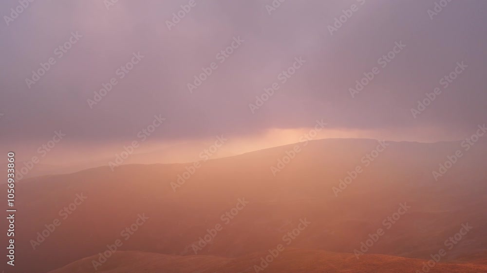Soft morning light spills over misty hills, creating a serene and dreamy landscape Soft morning light spills over misty hills, creating a serene and dreamy landscape