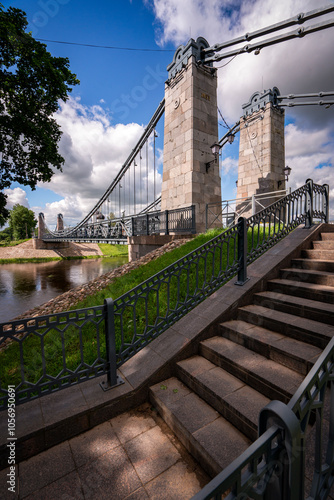 City of Ostrov, Chain Bridge over the Velikaya River. Pskov Region, Russia.