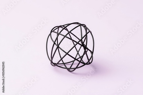 A black ring on a pink background - Backgrounds