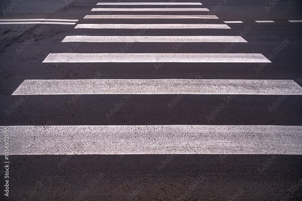 Cross walk empty. Pedestrian crossing. Asphalt road background. Crosswalk top view. Road surfaces and highways.