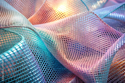 A close-up of shimmering, colorful mesh fabric, featuring a wave-like texture and iridescent light effects. photo