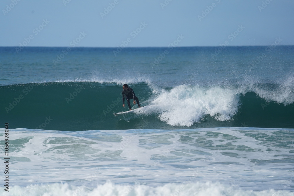 surfing sports in the waves in portugal during the winter season surfing sports in the waves in portugal during the winter season