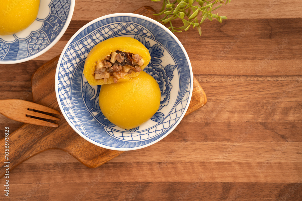 Sweet potato yam bun with ground pork meat, mushroom and chopped bamboo shoot fillings inside.