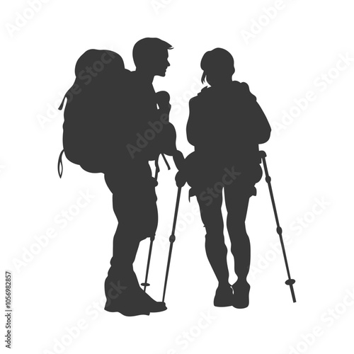 Silhouette of Two Hikers with Backpacks and Trekking Poles