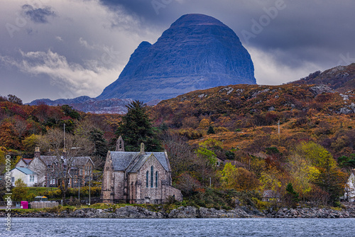 The mighty Suilven towers over the village of Lochinver in the Highlands of Scotland.