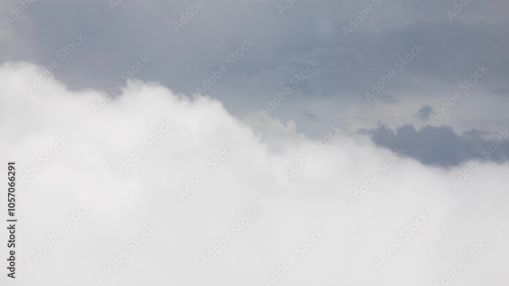 view from plane over blue sky with white Fluffy clouds while flying through in sunny summer time.nature blue sky cloud and sun for Clean Environment, save energy or transportation holiday concept. view from plane over blue sky with white Fluffy clouds while flying through in sunny summer time.nature blue sky cloud and sun for Clean Environment, save energy or transportation holiday concept.