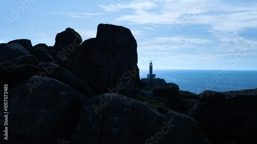 Rock formations at the Punta Nariga Lighthouse located at Punta Nariga, near Malpica de Bergantiños in the province of La Coruña. Galicia. Spain. Europe