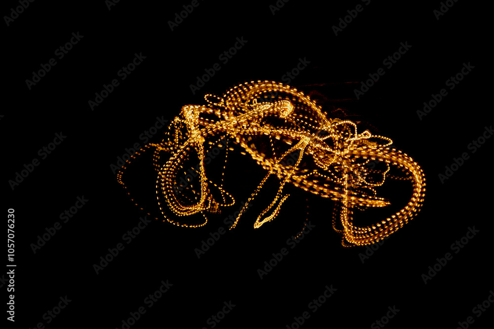 malowane światłem, obraz świetlny z wzorami i kształtami, abstrakcyjna fotografia z poruszającymi się światłami, Blurred Light painting, żółte maziaje świetlne, light painting photography, abstarct