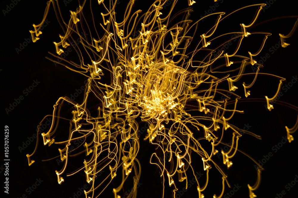 malowane światłem, obraz świetlny z wzorami i kształtami, abstrakcyjna fotografia z poruszającymi się światłami, Blurred Light painting, żółte maziaje świetlne, light painting photography, abstarct