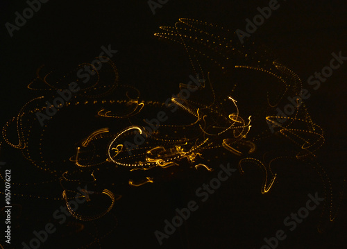 Obraz na płótnie malowane światłem, obraz świetlny z wzorami i kształtami, abstrakcyjna fotografia z poruszającymi się światłami, Blurred Light painting, żółte maziaje świetlne, light painting photography, abstarct w salonie