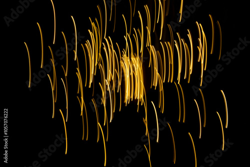 Obraz na płótnie malowane światłem, obraz świetlny z wzorami i kształtami, abstrakcyjna fotografia z poruszającymi się światłami, Blurred Light painting, żółte maziaje świetlne, light painting photography, abstarct w salonie