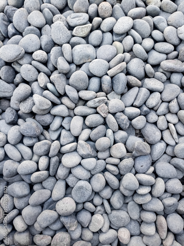 Small grey stones in close-up background texture,spa concept Small grey stones in close-up background texture,spa concept