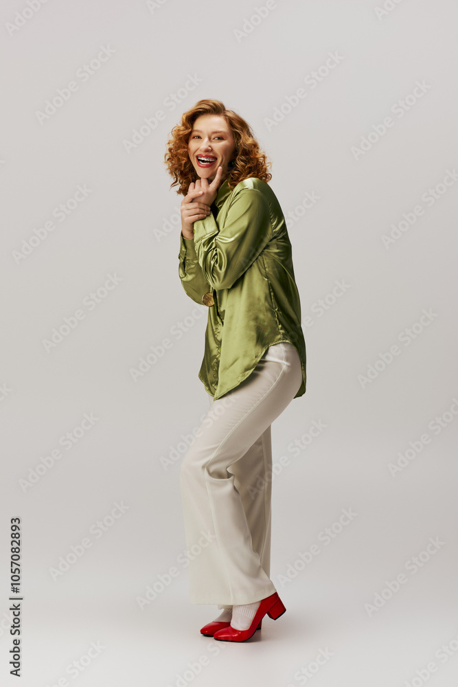 A cheerful young woman joyfully prepares a beautifully wrapped gift while celebrating. A cheerful young woman joyfully prepares a beautifully wrapped gift while celebrating.