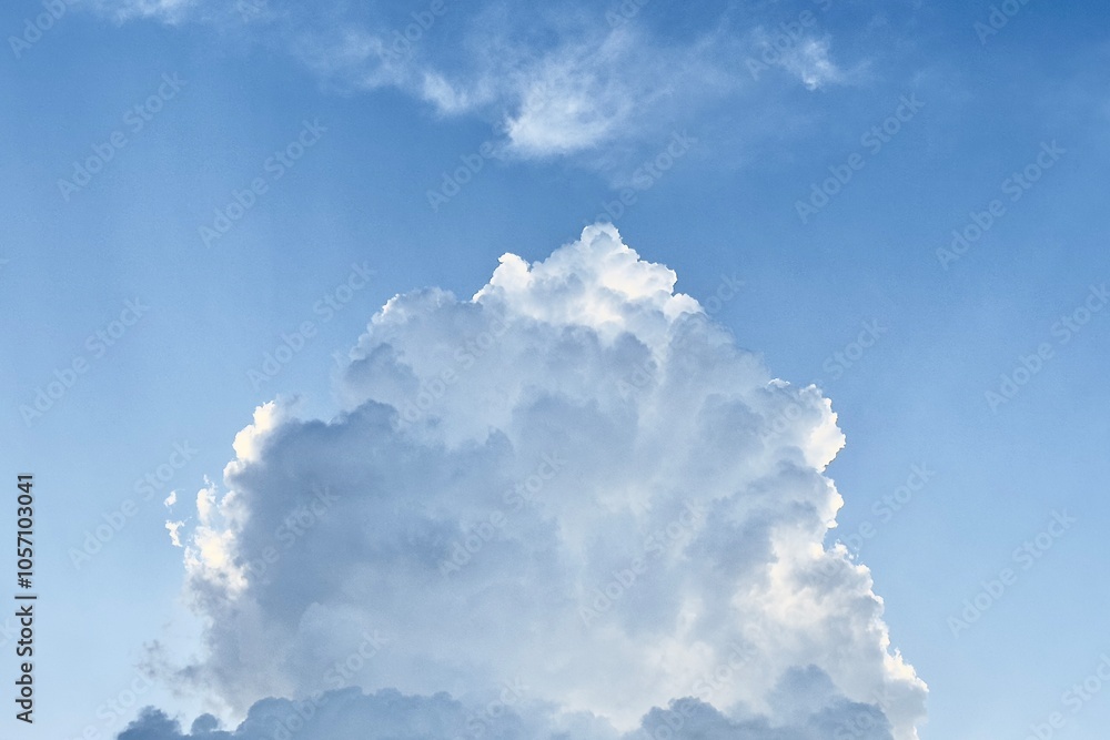 Ταπετσαρία This image captures a beautiful, fluffy cloud against a clear blue sky