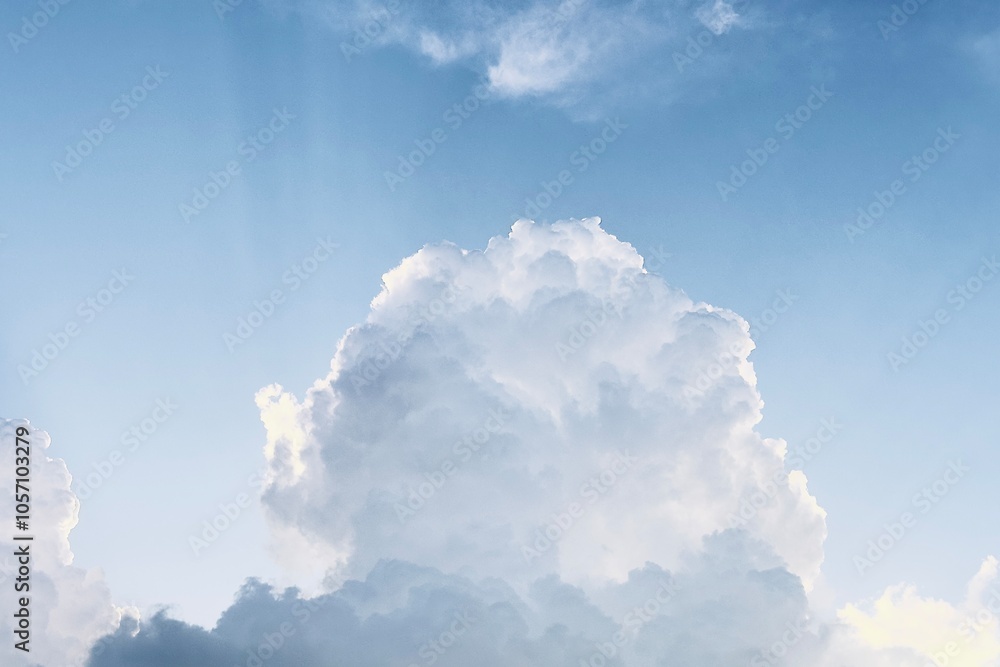 Ταπετσαρία This image captures a beautiful, fluffy cloud against a clear blue sky