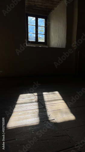 Sunlight from the window through the ancient windows in the castle, view from the inside. Poland photo