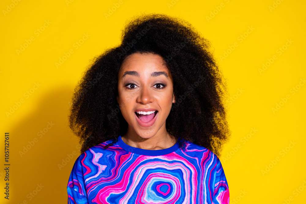 Photo portrait of lovely young lady excited amazed reaction dressed stylish colorful blue garment isolated on yellow color background Photo portrait of lovely young lady excited amazed reaction dressed stylish colorful blue garment isolated on yellow color background