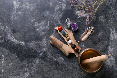 Photography Set of chakra stones, flowers and Tibetan singing bowl on grunge background