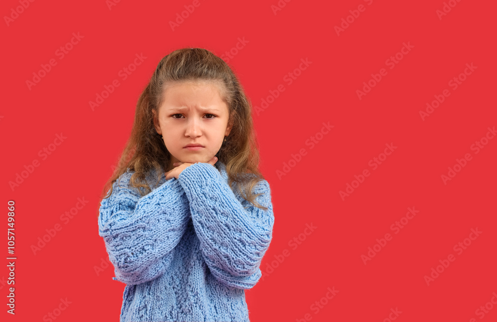Sick little girl with sore throat on red background Sick little girl with sore throat on red background