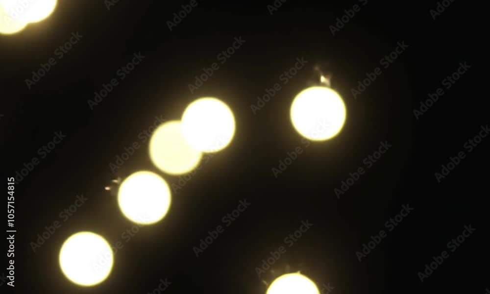 Beautiful round blur light flashes and twinkles moving gently against black background Beautiful round blur light flashes and twinkles moving gently against black background