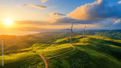 Aerial view of modern electric turbines on a coastal wind farm, set against dramatic skies, representing renewable energy and sustainable infrastructure