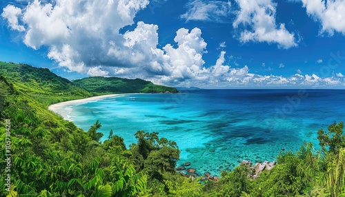 Lush Green Coastline With Crystal Clear Blue Water and White Sand Beach