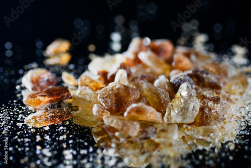 Картината върху платно Concept photo of brown sugar rock candy