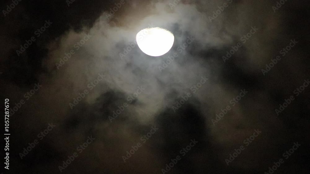 Half moon and clouds moving at night Half moon and clouds moving at night
