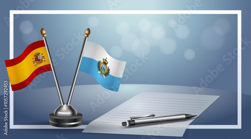 Spain and San Marino Small national flag on bokeh background, cooperative relationship
