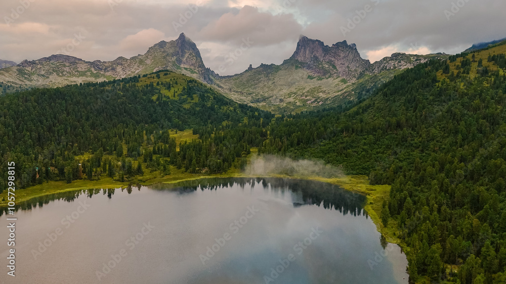 Fototapeta premium the lake is Bright at sunset, filmed from a drone