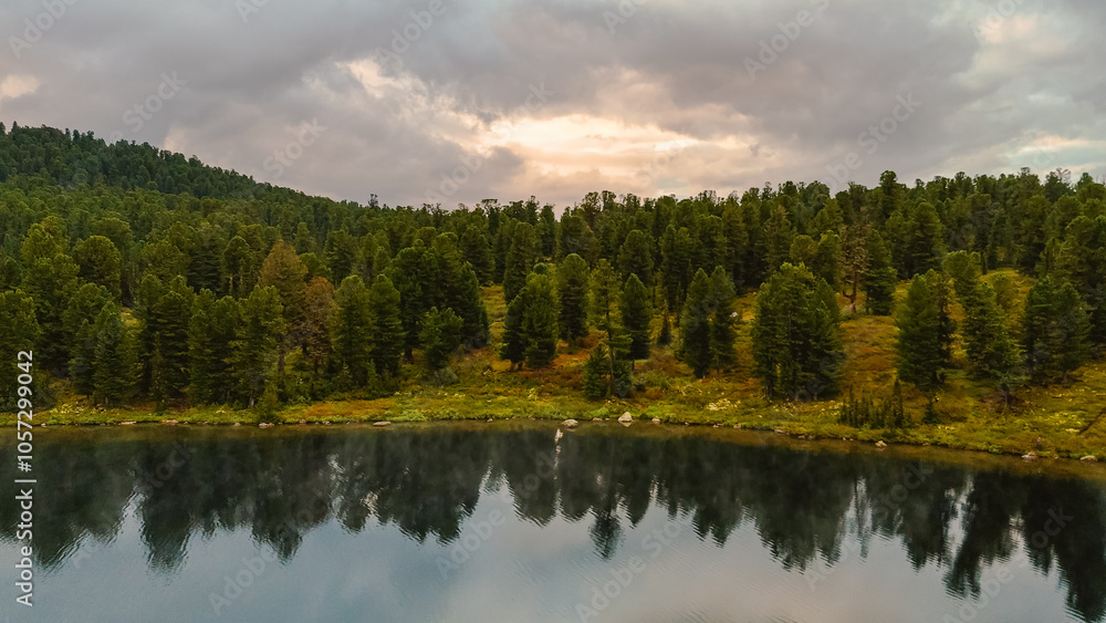 the lake is Bright at sunset, filmed from a drone the lake is Bright at sunset, filmed from a drone