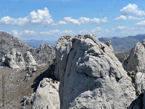 Rocky ridge of Tulove grede or karst mountain peak of Tulovice - Velebit Nature Park, Croatia (Stjenoviti greben Tulove grede ili krški planinski vrh Tulovice - Park prirode Velebit, Hrvatska) photo