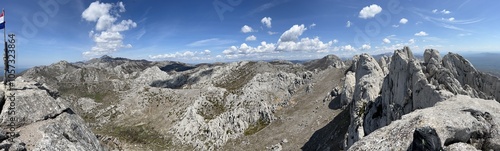 Wallpaper Mural Rocky ridge of Tulove grede or karst mountain peak of Tulovice - Velebit Nature Park, Croatia (Stjenoviti greben Tulove grede ili krški planinski vrh Tulovice - Park prirode Velebit, Hrvatska) Torontodigital.ca