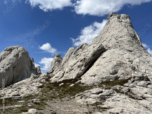 Rocky ridge of Tulove grede or karst mountain peak of Tulovice - Velebit Nature Park, Croatia (Stjenoviti greben Tulove grede ili krški planinski vrh Tulovice - Park prirode Velebit, Hrvatska) photo