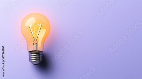 Illuminated incandescent light bulb against a pastel purple background with a soft shadow effect