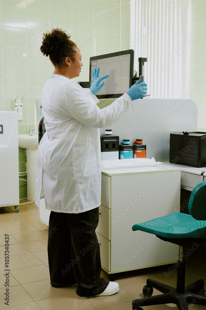 Scientist conducting research by utilizing laboratory equipment in a modern lab setting with various instruments and materials around. She wears lab coat and safety gloves Scientist conducting research by utilizing laboratory equipment in a modern lab setting with various instruments and materials around. She wears lab coat and safety gloves